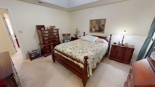 bedroom with light carpet and visible vents