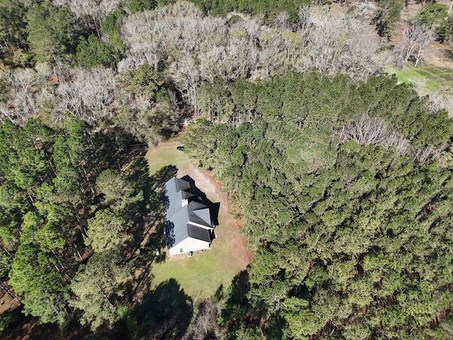 drone / aerial view with a view of trees