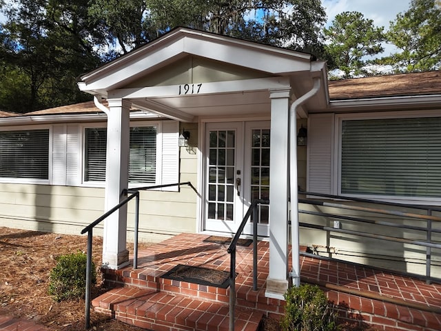 doorway to property featuring french doors