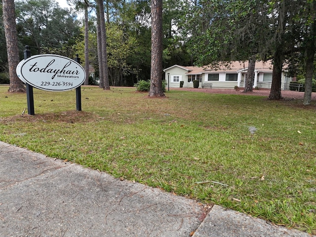 exterior space with a yard