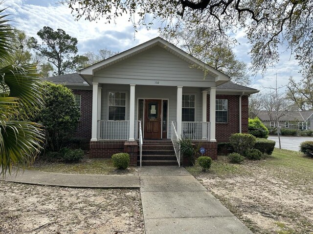 bungalow-style home with a porch