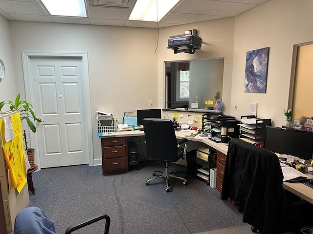 office with a paneled ceiling