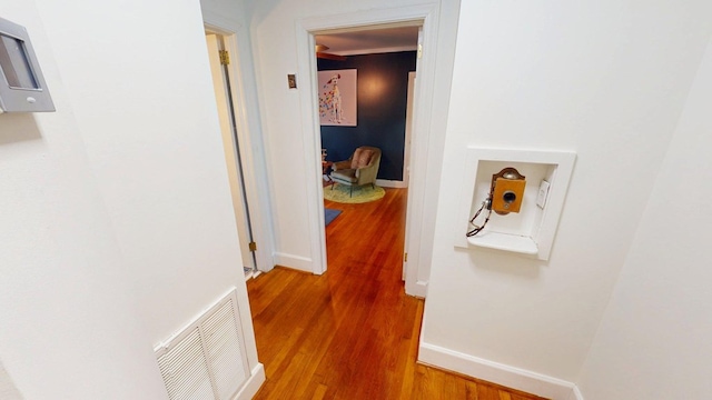 303 Glenwood Dr, Thomasville, GA 31792 - corridor featuring wood finished floors and baseboards