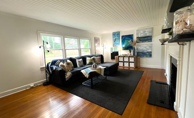303 Glenwood Dr, Thomasville, GA 31792 - living area featuring a fireplace with flush hearth, wood finished floors, and wood ceiling