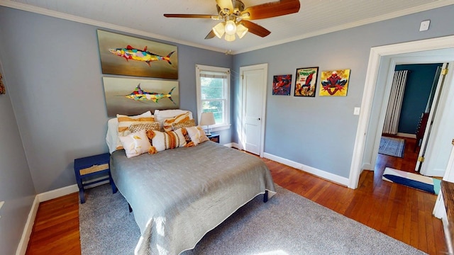 303 Glenwood Dr, Thomasville, GA 31792 - bedroom featuring ornamental molding, wood finished floors, and a ceiling fan