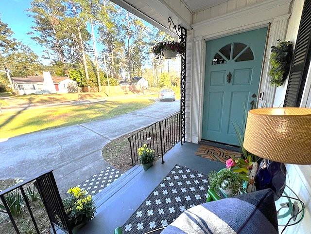303 Glenwood Dr, Thomasville, GA 31792 - view of exterior entry with a porch