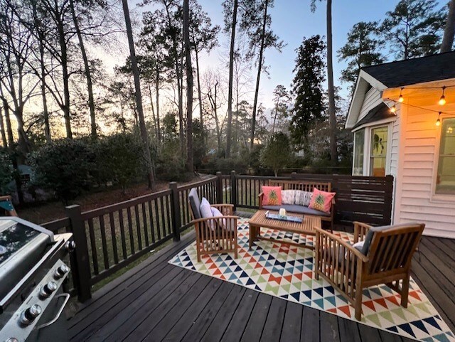 303 Glenwood Dr, Thomasville, GA 31792 - deck with an outdoor hangout area and area for grilling