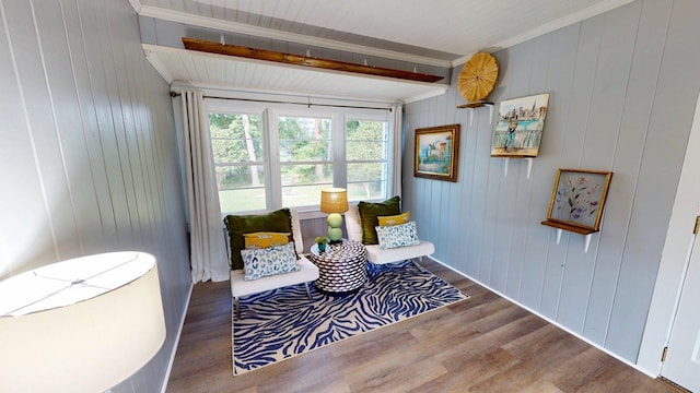 303 Glenwood Dr, Thomasville, GA 31792 - sitting room with wood finished floors, wooden walls, beam ceiling, and ornamental molding