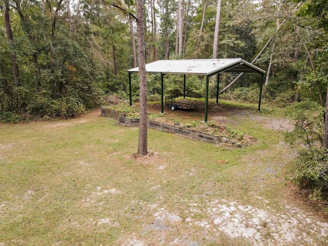 view of yard featuring a carport