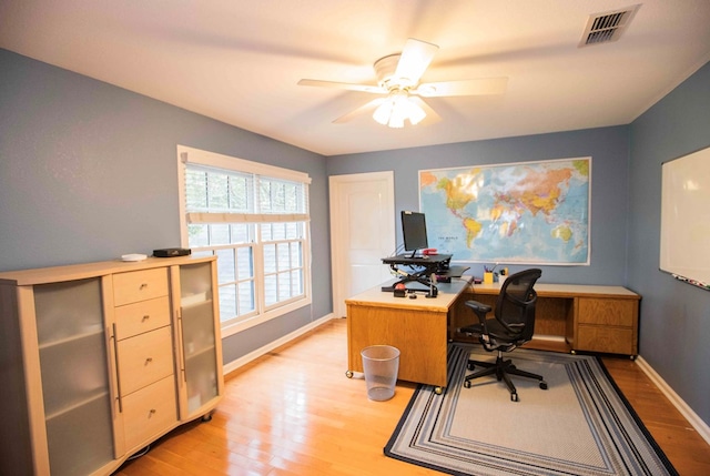 office featuring ceiling fan and light hardwood / wood-style floors