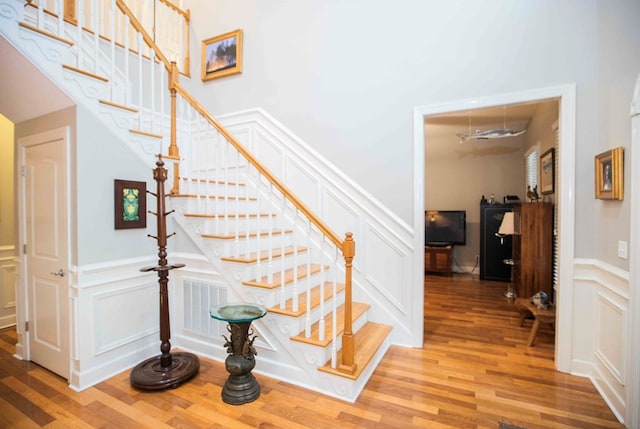 stairway with wood-type flooring