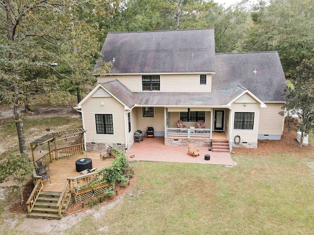 back of house with a patio, a deck, cooling unit, a yard, and a pergola