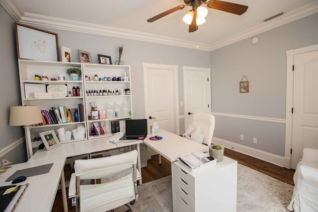 home office with light hardwood / wood-style flooring, ornamental molding, and ceiling fan