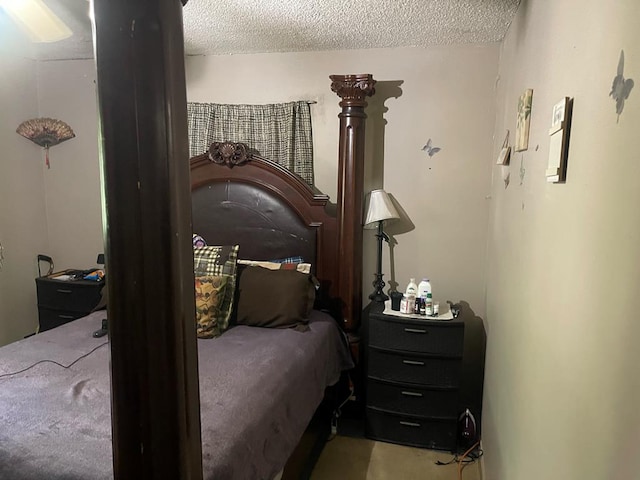 bedroom featuring a textured ceiling