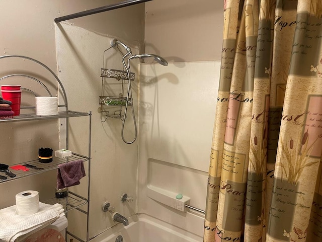 bathroom with shower / tub combo with curtain