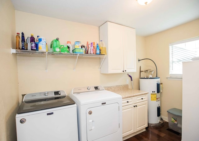 laundry room featuring separate washer and dryer, cabinets, dark hardwood / wood-style floors, and water heater