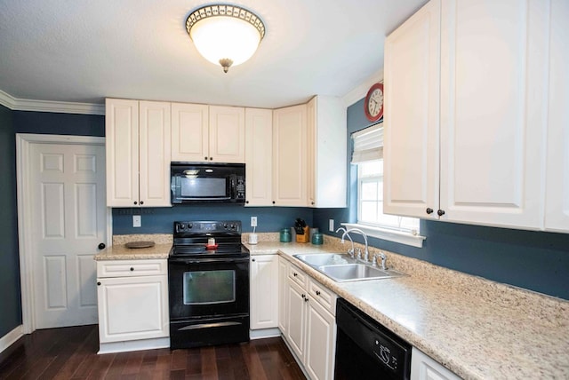 kitchen featuring white cabinetry, sink, black appliances, and dark hardwood / wood-style floors