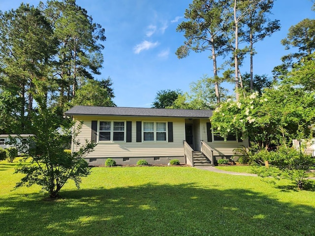 1010 Joree Dr, Thomasville, GA 31792 - view of front facade featuring crawl space and a front lawn