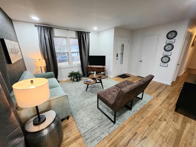 living room featuring light wood-type flooring