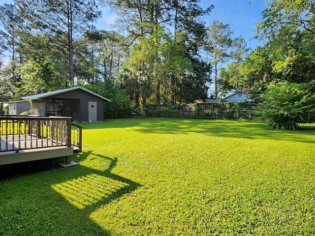 1010 Joree Dr, Thomasville, GA 31792 - view of yard with a deck and an outbuilding