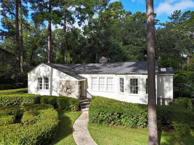 view of front of property featuring a chimney