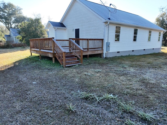 40 Beacon St, Camilla, GA 31730 - rear view of house featuring crawl space, a wooden deck, and roof with shingles
