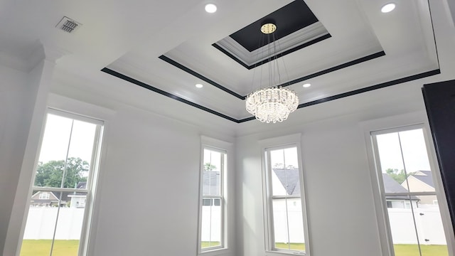 347 Madison Grv, Thomasville, GA 31757 - detailed view of ornamental molding, a raised ceiling, a chandelier, and recessed lighting