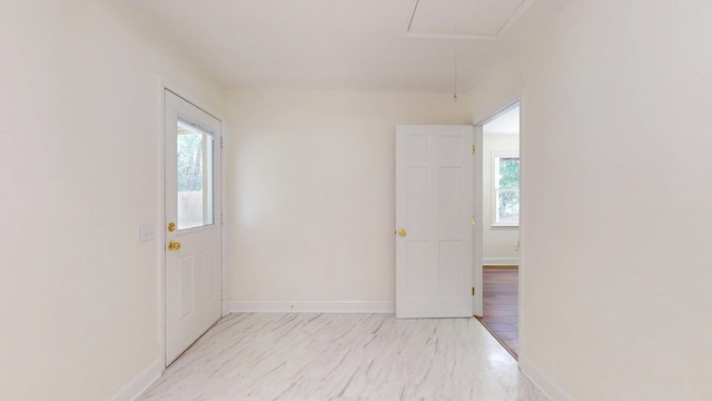 193 E Live Oak Cir, Thomasville, GA 31792 - empty room featuring attic access and healthy amount of natural light