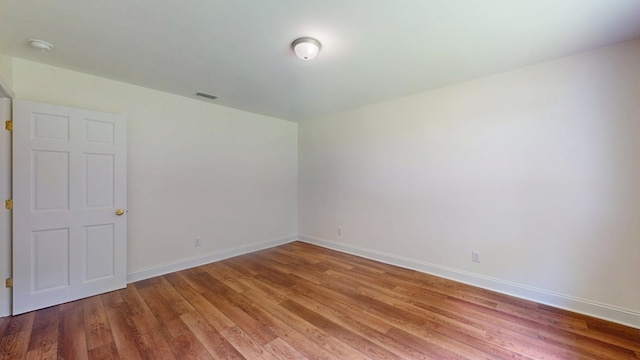193 E Live Oak Cir, Thomasville, GA 31792 - empty room featuring light wood-style flooring and a smoke detector