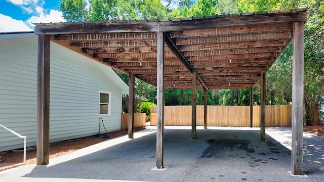193 E Live Oak Cir, Thomasville, GA 31792 - view of parking / parking lot featuring a carport