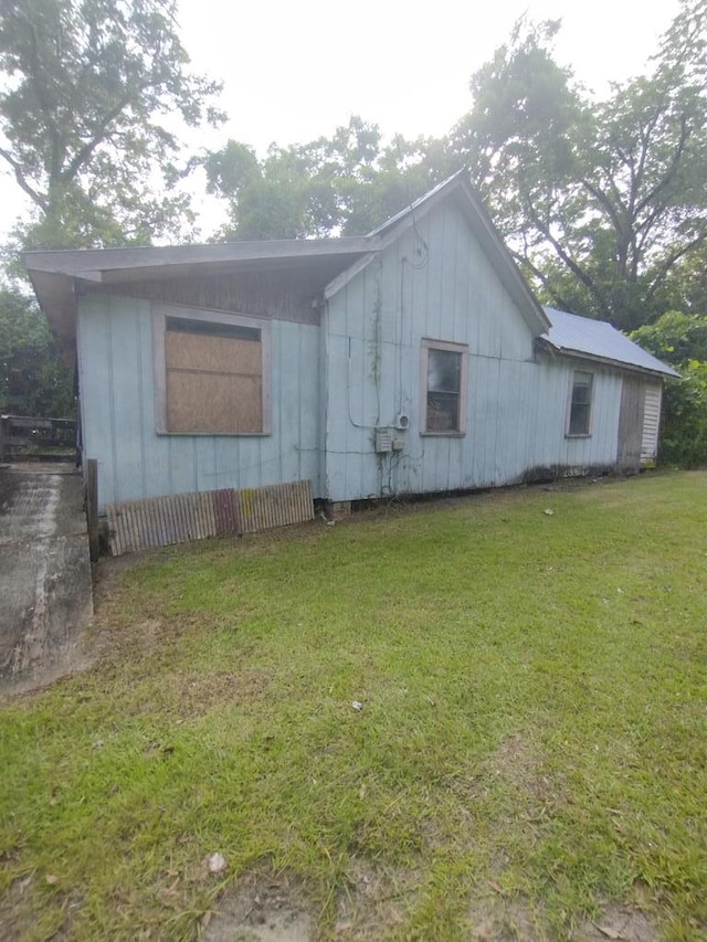 544 W Clay St, Thomasville, GA 31792 - view of front of property featuring a front lawn and board and batten siding