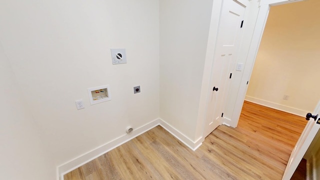 laundry area featuring washer hookup, electric dryer hookup, baseboards, and wood finished floors