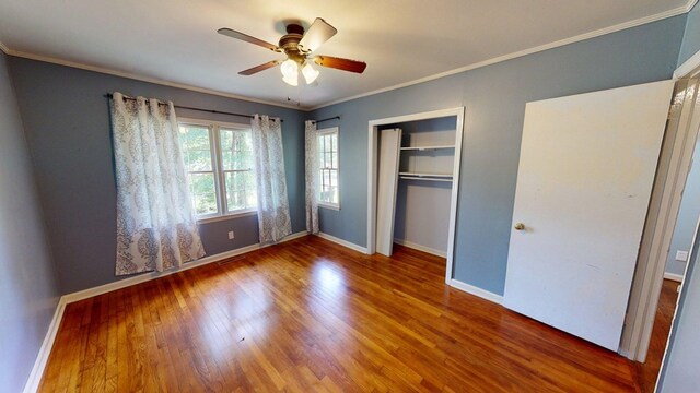 610 Partridge Dr, Thomasville, GA 31792 - unfurnished bedroom with ornamental molding, wood finished floors, baseboards, a closet, and a ceiling fan