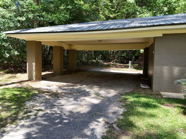 610 Partridge Dr, Thomasville, GA 31792 - view of parking / parking lot featuring driveway