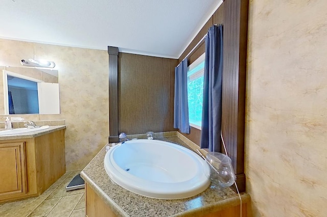 3024 Willow St, Ochlocknee, GA 31773 - bathroom featuring vanity, a garden tub, and tile patterned floors