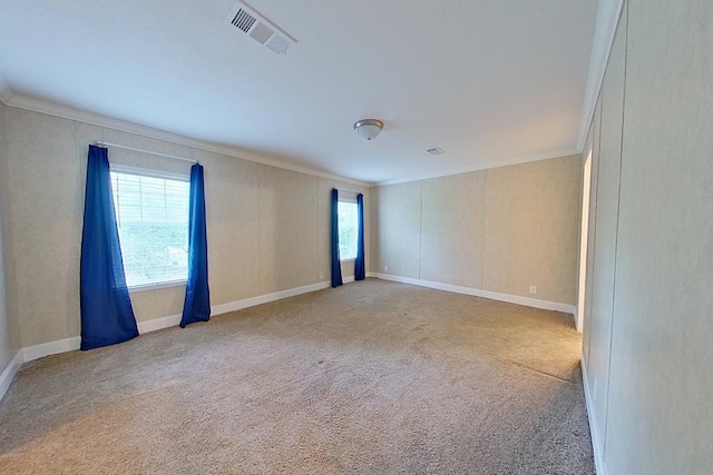 3024 Willow St, Ochlocknee, GA 31773 - empty room featuring crown molding and carpet flooring