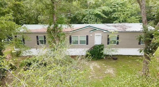 3024 Willow St, Ochlocknee, GA 31773 - manufactured / mobile home featuring a metal roof