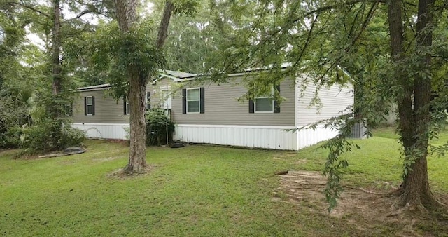 3024 Willow St, Ochlocknee, GA 31773 - view of side of property with a lawn