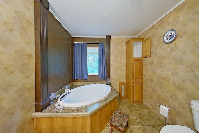 3024 Willow St, Ochlocknee, GA 31773 - bathroom with a bath, a textured ceiling, crown molding, and tile patterned flooring