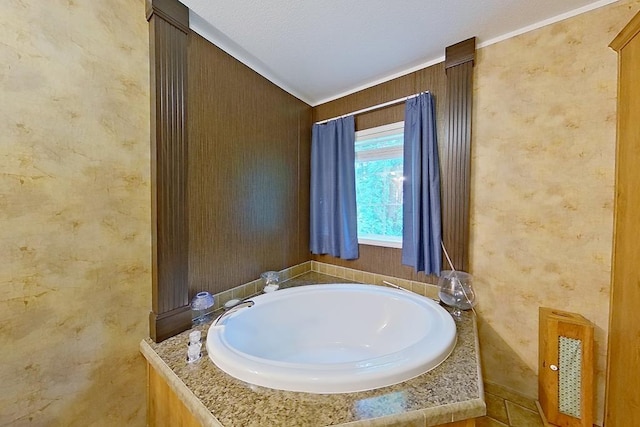 3024 Willow St, Ochlocknee, GA 31773 - bathroom featuring a garden tub and crown molding