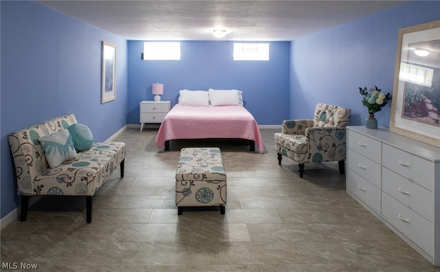 bedroom with tile floors