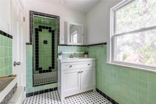 bathroom with plenty of natural light and tile floors