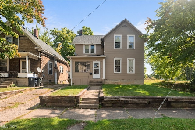 view of front facade with a front lawn