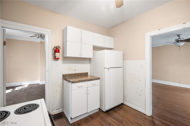 kitchen with white fridge, white cabinetry, electric range, dark hardwood / wood-style floors, and ceiling fan