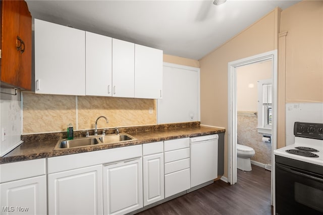 kitchen with white cabinets, white appliances, dark hardwood / wood-style flooring, sink, and lofted ceiling