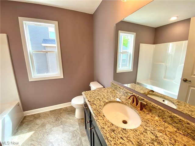 full bathroom featuring vanity, toilet, and shower / bath combination