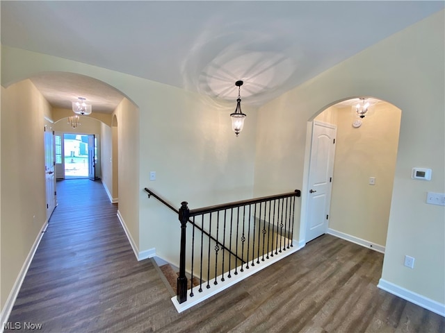 hallway featuring dark wood-type flooring