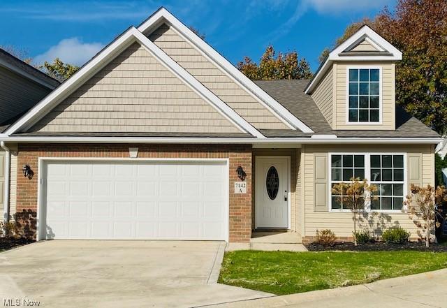 craftsman-style house featuring a garage