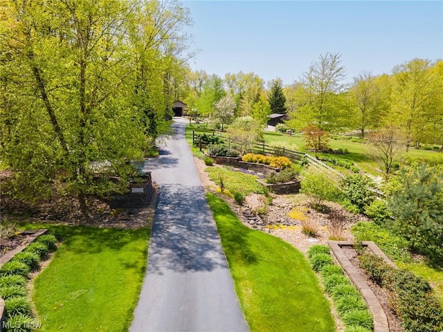 view of community featuring a lawn