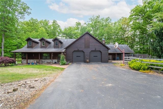 view of front facade with a front lawn and a garage